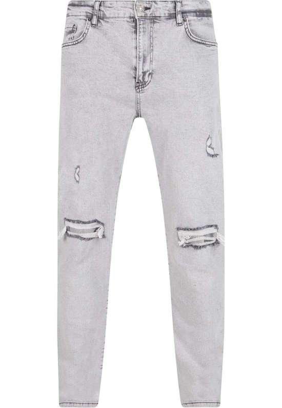 Джинсы узкого кроя