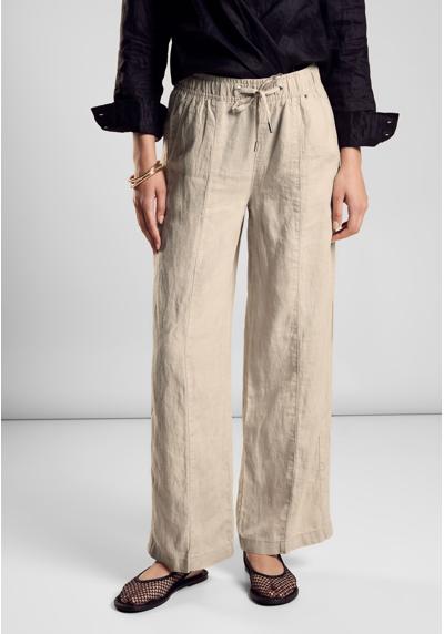 Тканевые брюки с боковыми карманами