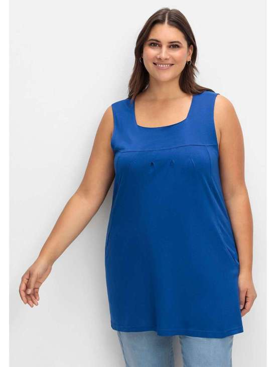 Длинный топ А-силуэта с карманами в швах. Große Größen