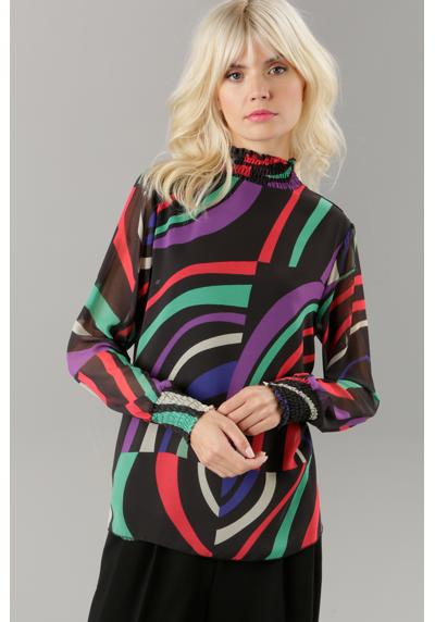 Шифоновая блузка с ярким графическим узором.