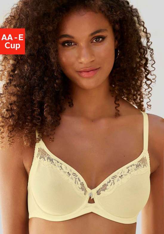 Бюстгальтер на косточках с тонкой кружевной отделкой и декоративным бантом спереди.