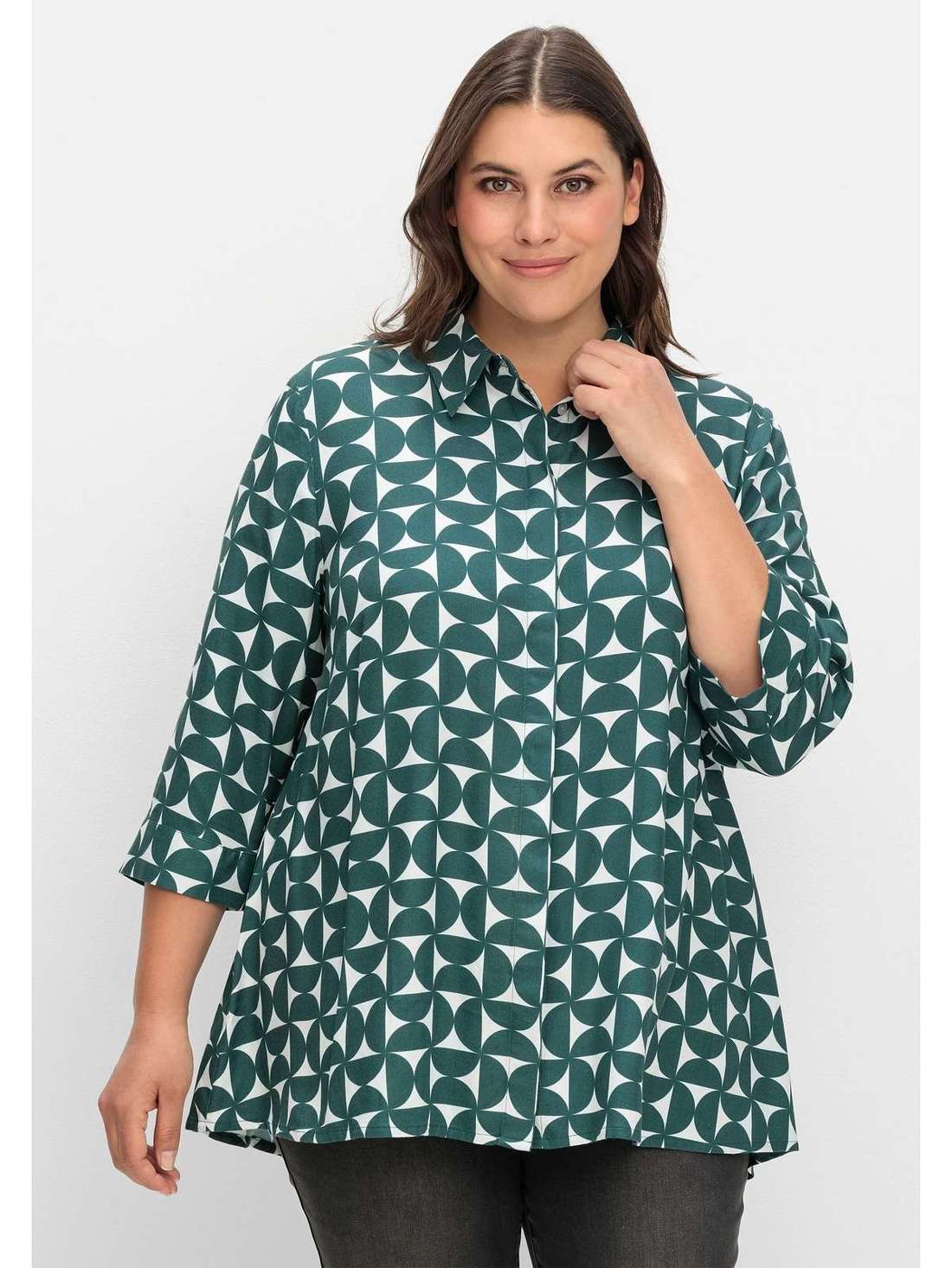 Длинная блузка струящегося А-силуэта Große Größen