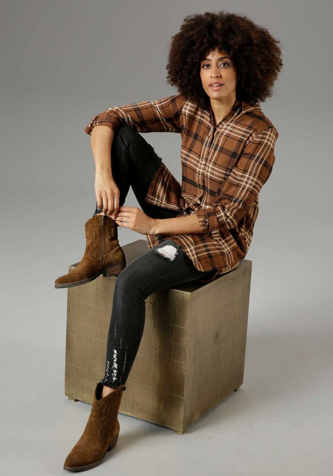 Длинная блузка в клетку