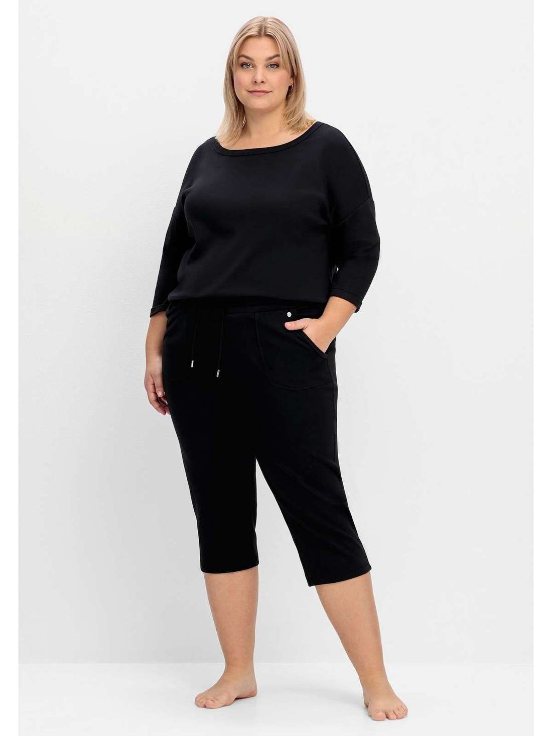 Брюки для релаксации длины капри с завязками. Große Größen