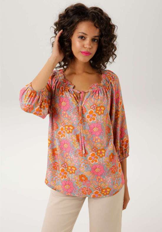 Блузка-слип с гармоничным цветочным принтом.