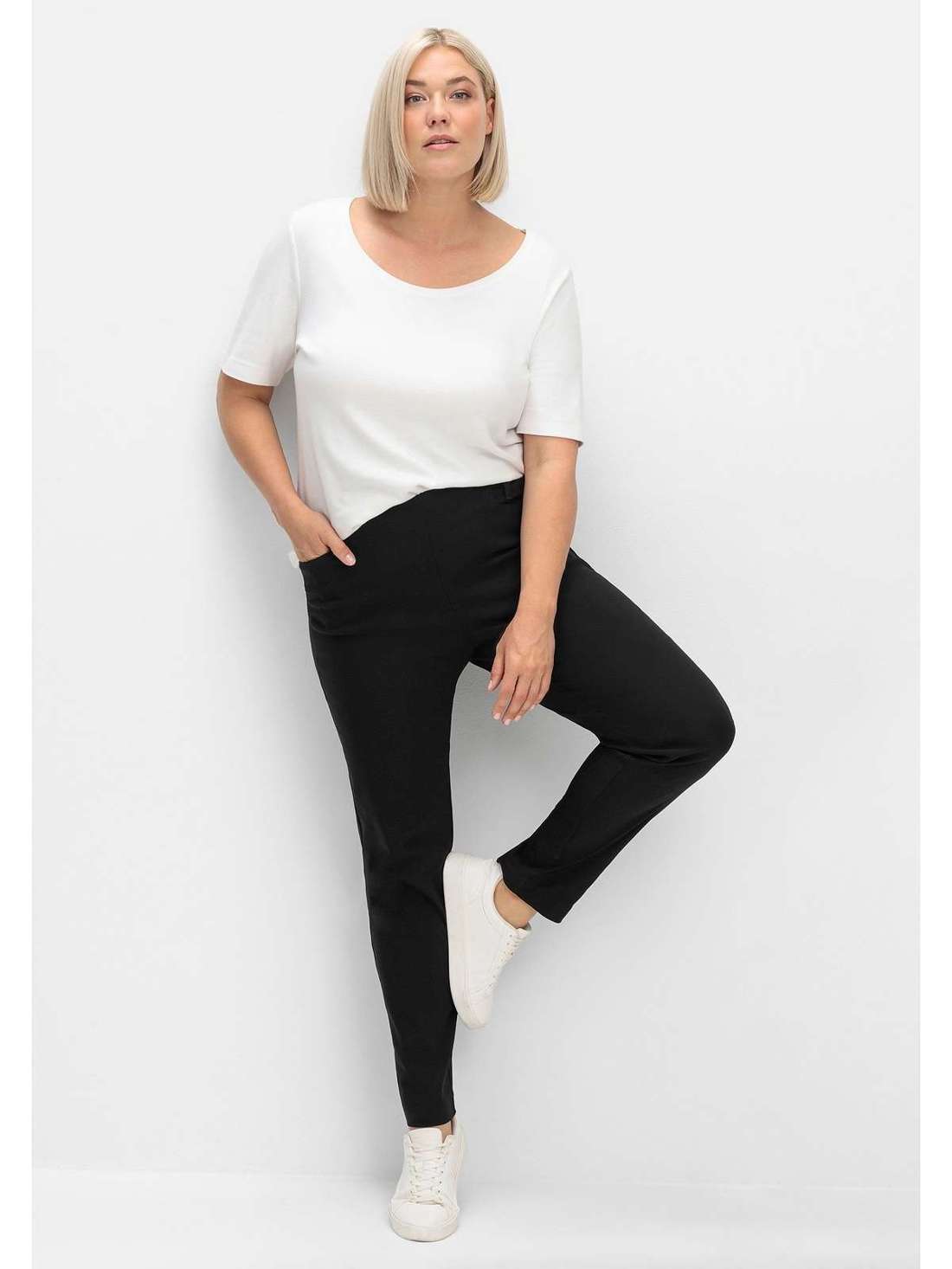 Брюки стрейч с моделирующей вставкой в области живота. Große Größen