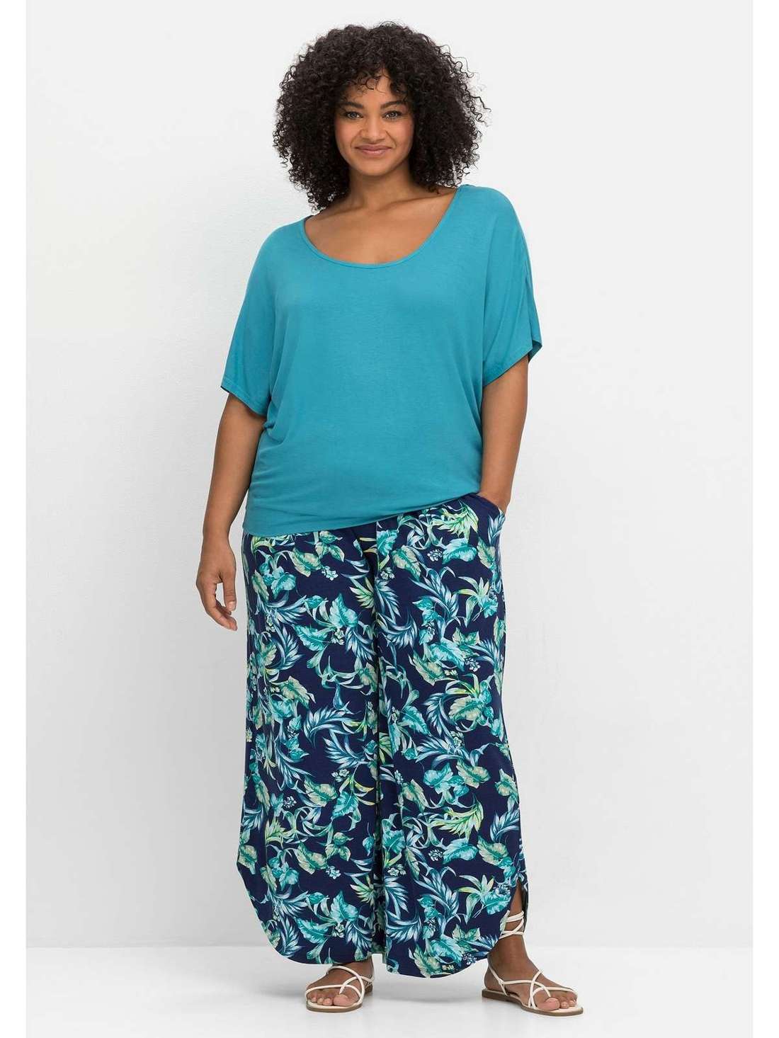 Брюки без застежки с принтом в виде листьев Große Größen