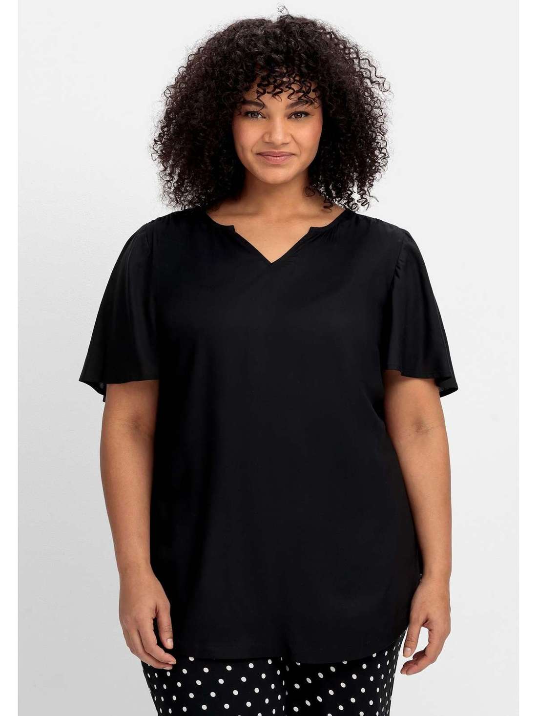 Туника с широкими рукавами легкого А-силуэта. Große Größen