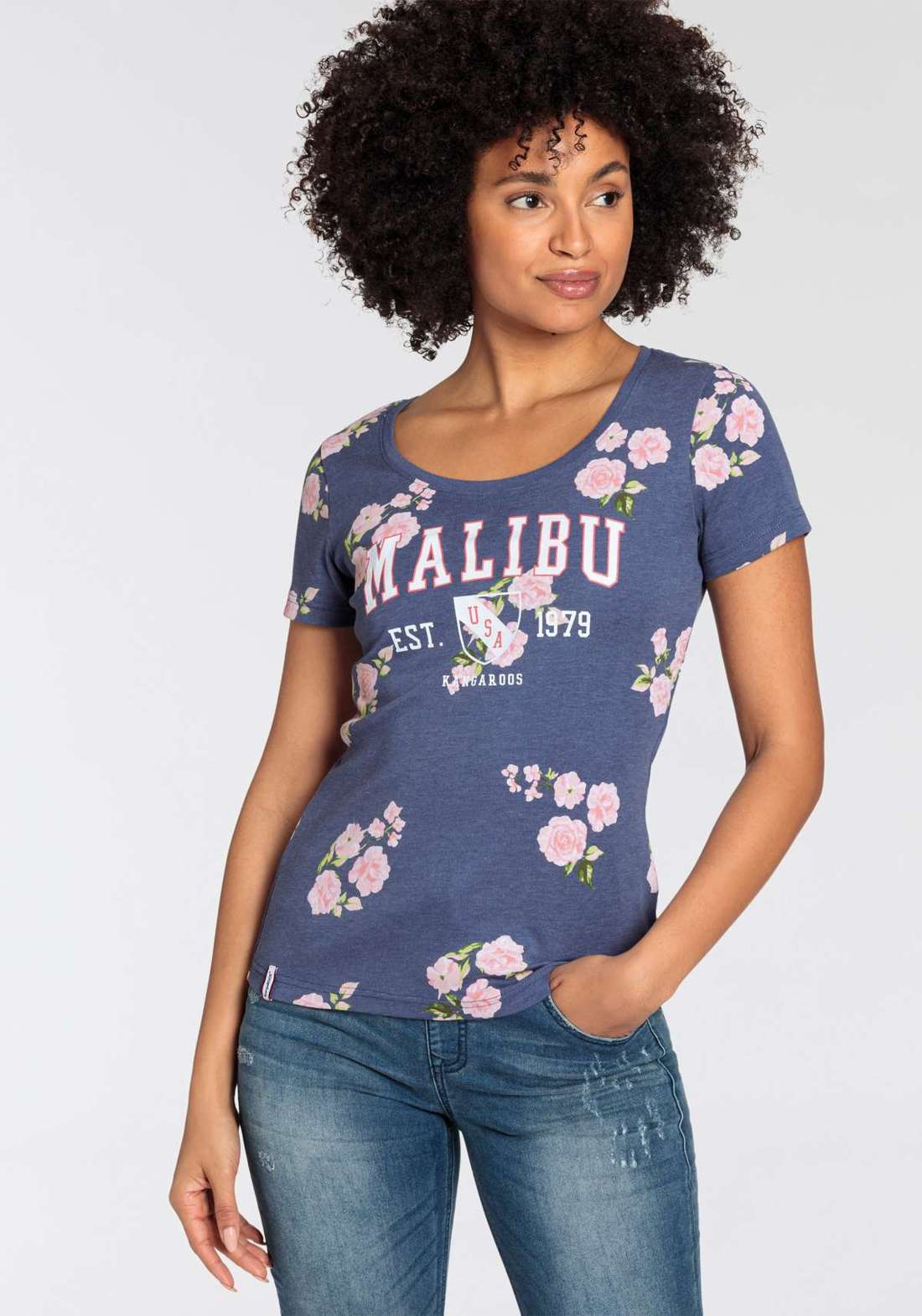 Рубашка с короткими рукавами с цветочным принтом и логотипом.