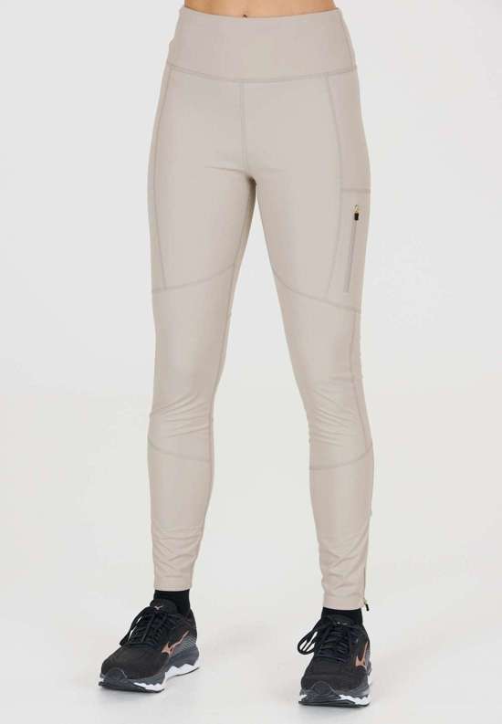 Тренировочные тайтсы с водоотталкивающими и ветрозащитными свойствами. Elinor