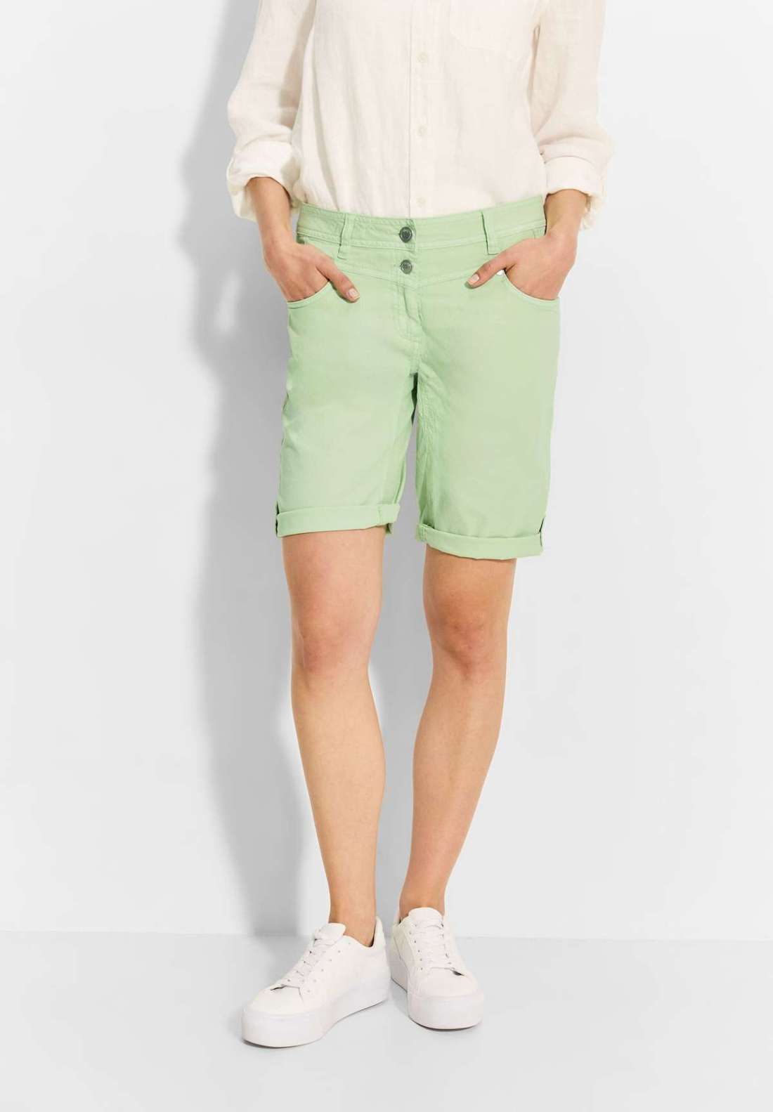 Брюки Bootcut с функцией отворота.