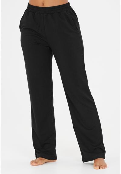 Спортивные штаны, растягивающиеся в четырех направлениях, в неподвластном времени дизайне. Diane