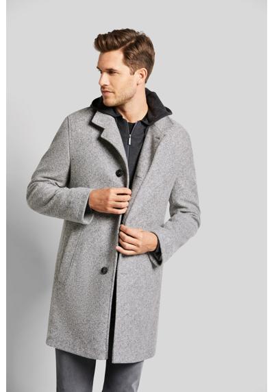 Шерстяное пальто меланжевого дизайна.