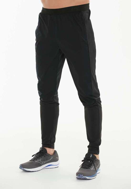 Брюки из ткани с водонепроницаемой функцией. Vinge