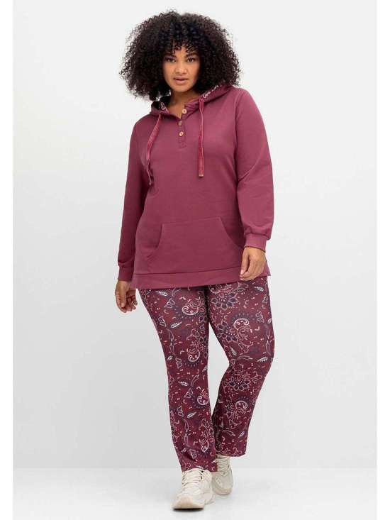 Брюки из джерси с принтом пейсли и фасоном «ботинка». Große Größen