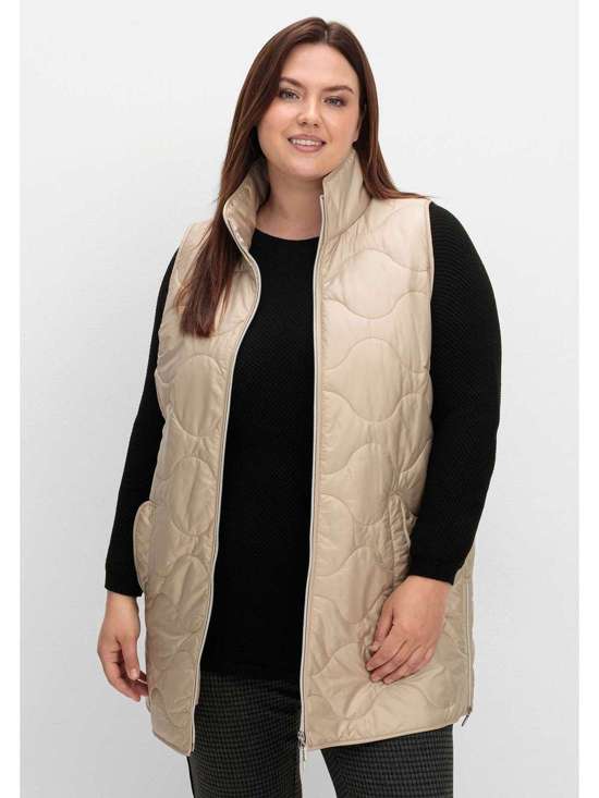 Длинный жилет с воротником стойкой и волнистой стежкой. Große Größen