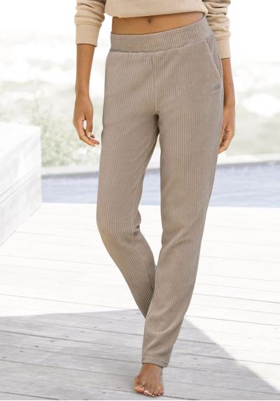 Вельветовые брюки-слипоны с удобными манжетами и широкой вельветовой структурой.