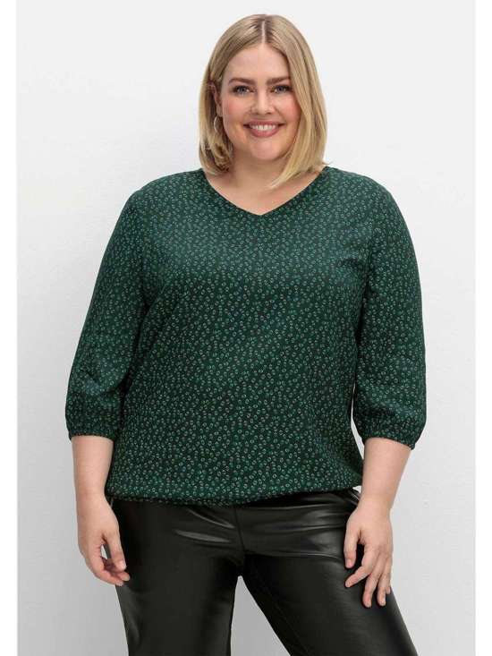 Туника с минимальным принтом и эластичным низом. Große Größen