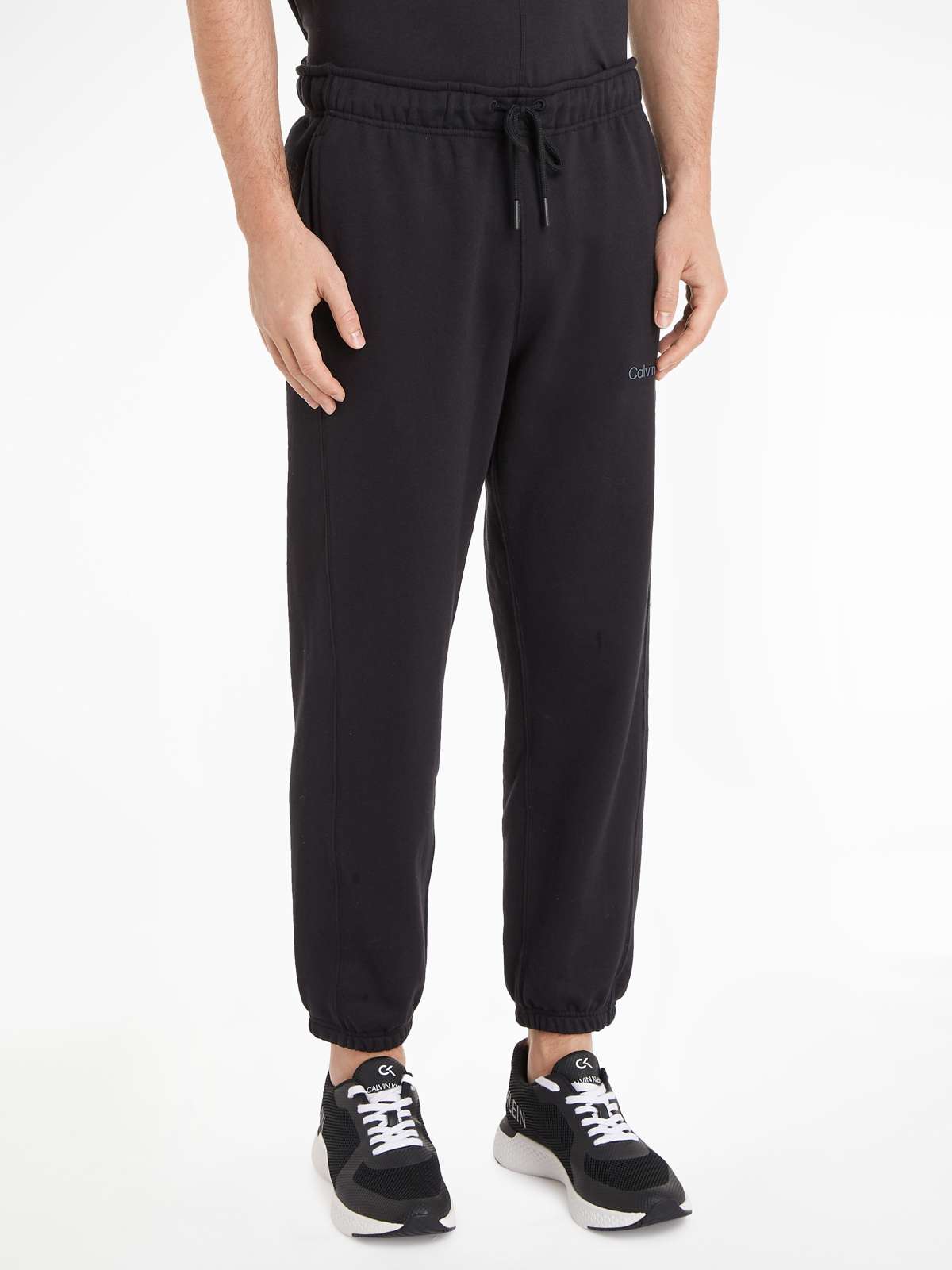 Спортивные брюки с логотипом Calvin Klein спереди.