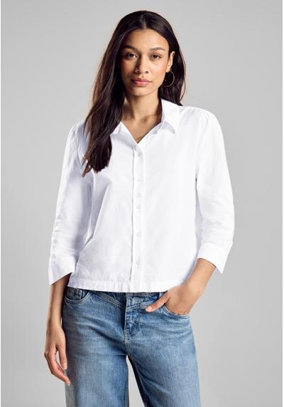 Блузка-рубашка с боковыми разрезами по подолу