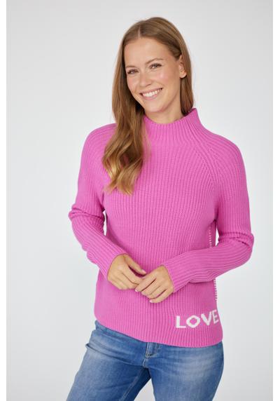 Вязаный свитер с вязаной надписью "LOVE"