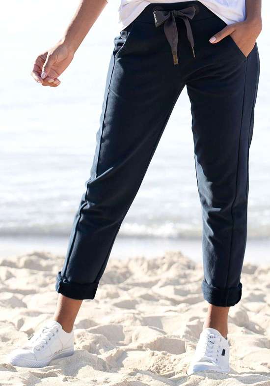 Спортивные брюки с логотипом на поясе и карманах. Brinja