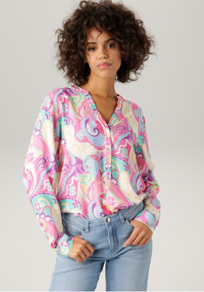 Блузка без шнуровки с графическим принтом в двух цветовых сочетаниях.