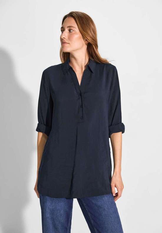 Длинная блузка с рукавами 3/4.