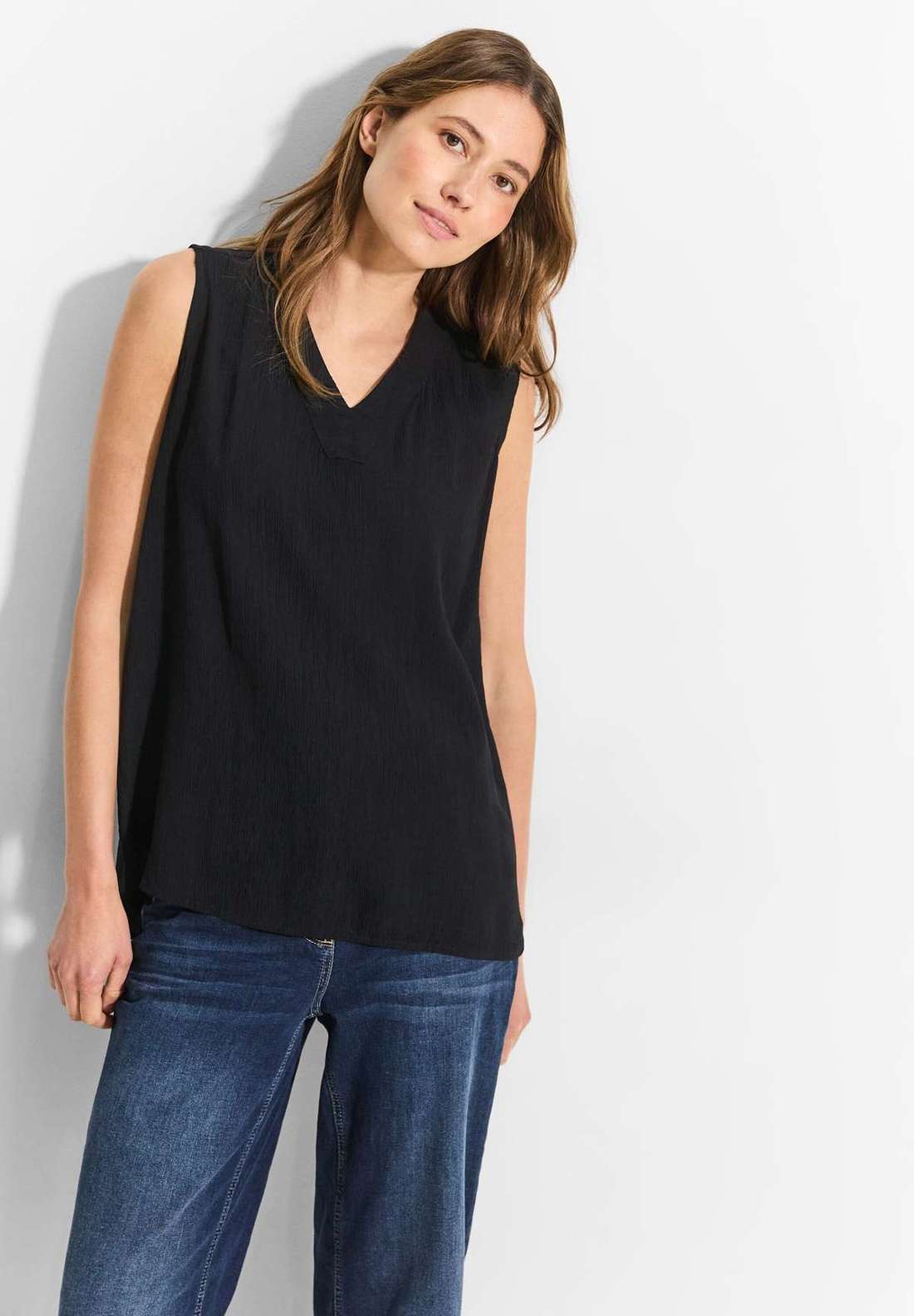 Блузка-топ с закругленным краем