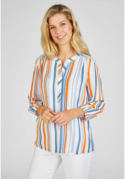 Блузка с длинными рукавами и цветными вертикальными полосками.
