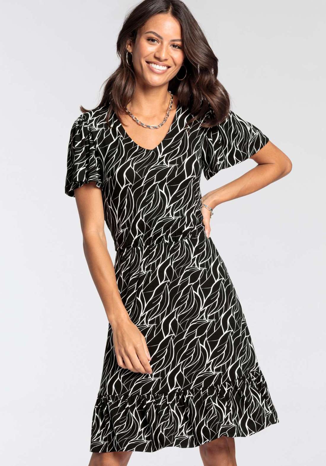 Платье из джерси с V-образным вырезом