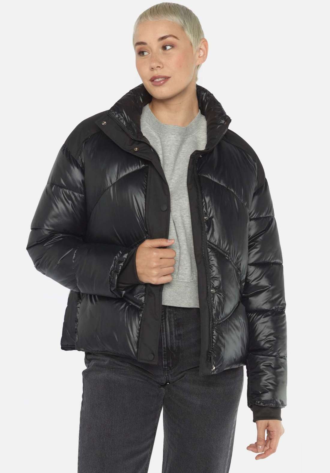 Стеганая куртка с боковыми карманами