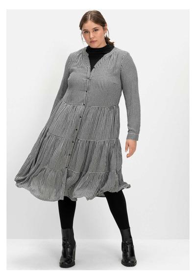 Платье-блузка с узором пепита, широкая расклешенная юбка.