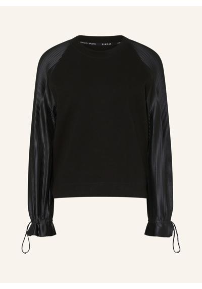 Длинный рукав из разных материалов.