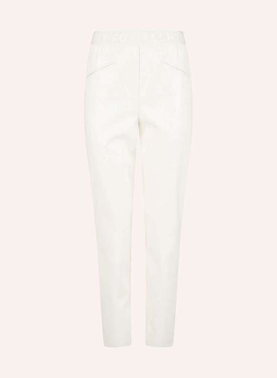 Брюки под кожу