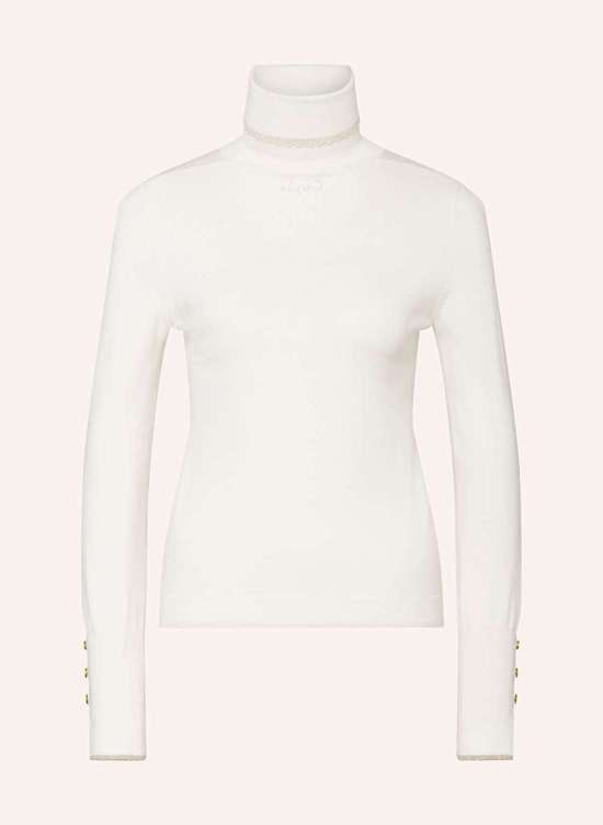 Свитер-водолазка из блестящей пряжи