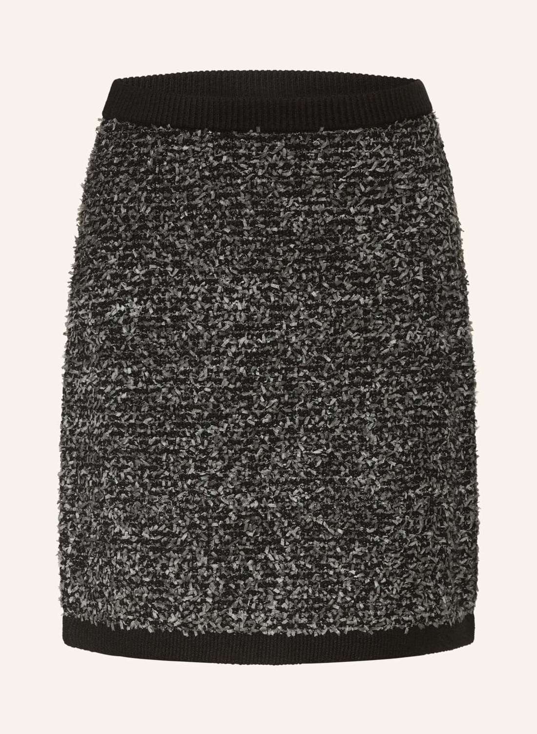 Вязаная юбка из блестящей пряжи