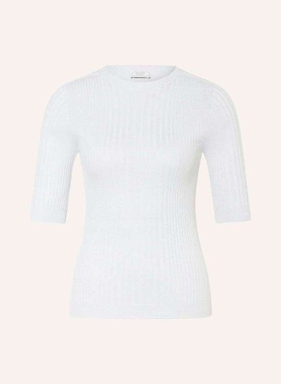 Вязаная рубашка из блестящей пряжи