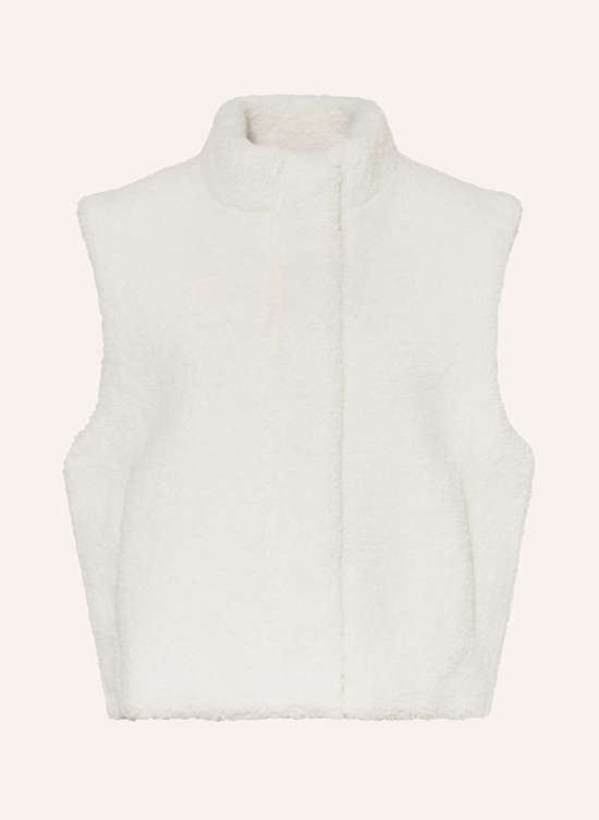 Меховой жилет тедди