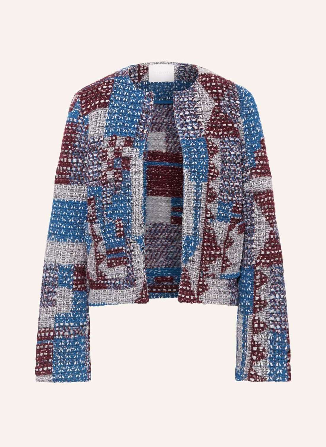 Вязаный чехол из блестящей пряжи.