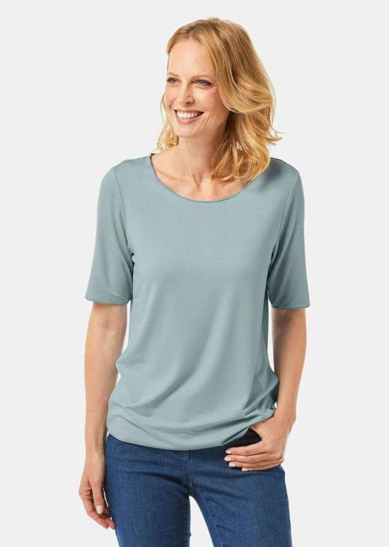 Комбинированная рубашка с короткими рукавами и декоративной каймой в тон.