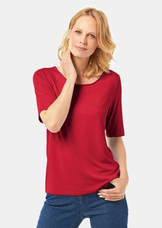 Комбинированная рубашка с короткими рукавами и декоративной каймой в тон.