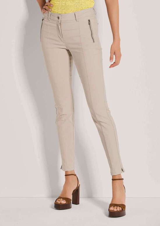 Узкие брюки с карманами на молнии
