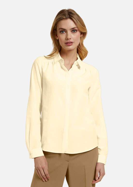 Блузка с рюшами