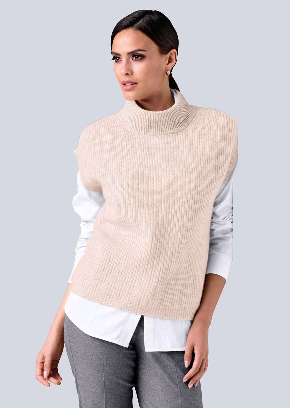 Свитер-жилет из высококачественного чистого кашемира.