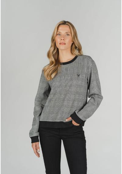 Толстовка-свитер с модным узором и аппликациями-лейблами.