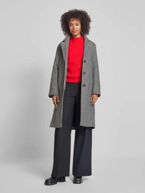 Вязаный свитер с ребристыми манжетами