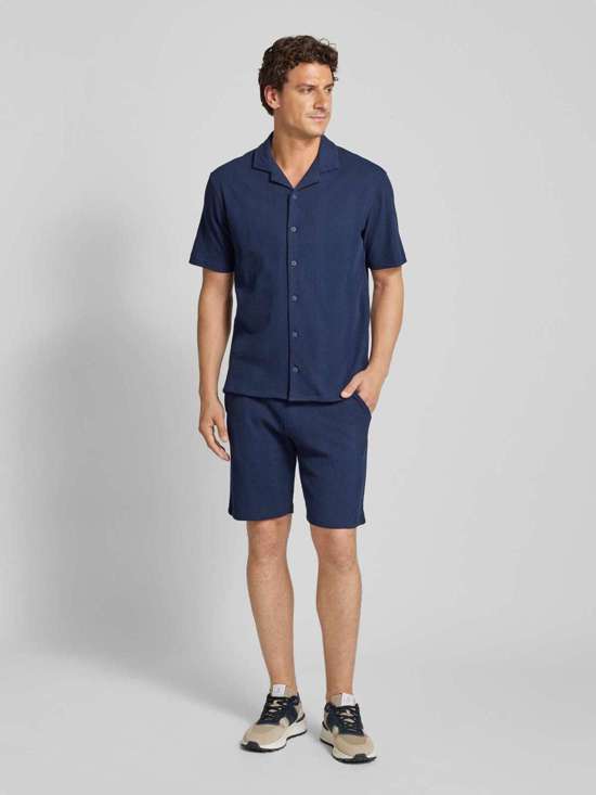 Шорты с боковыми карманами