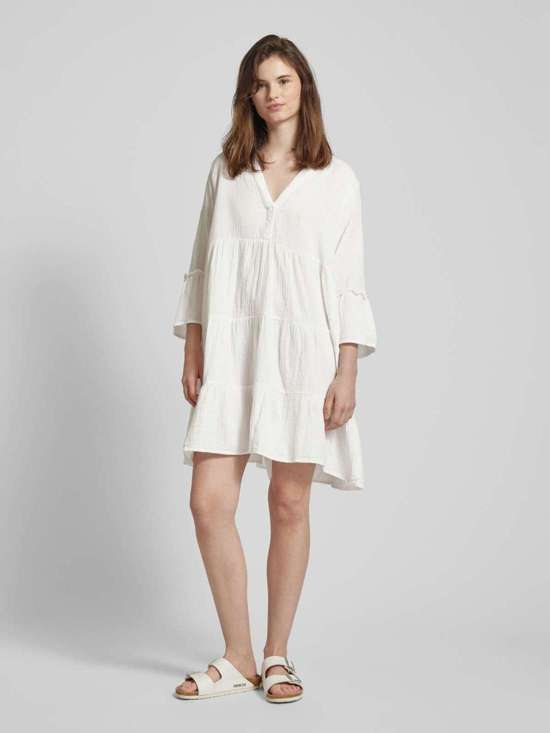 Мини-платье в многоярусном образе THYRA