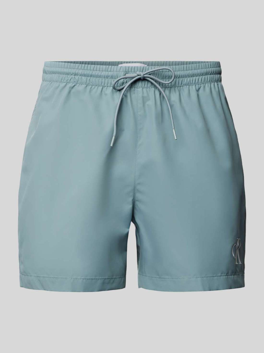 Купальные шорты стандартного кроя с принтом этикетки